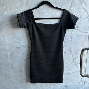 Un Deux Trois black tight dress